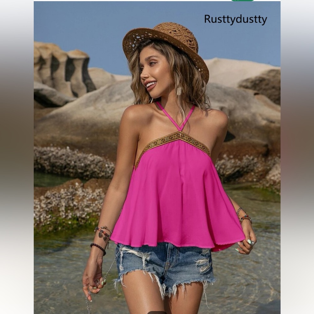 Bright pink flowy top with satin stitched edging